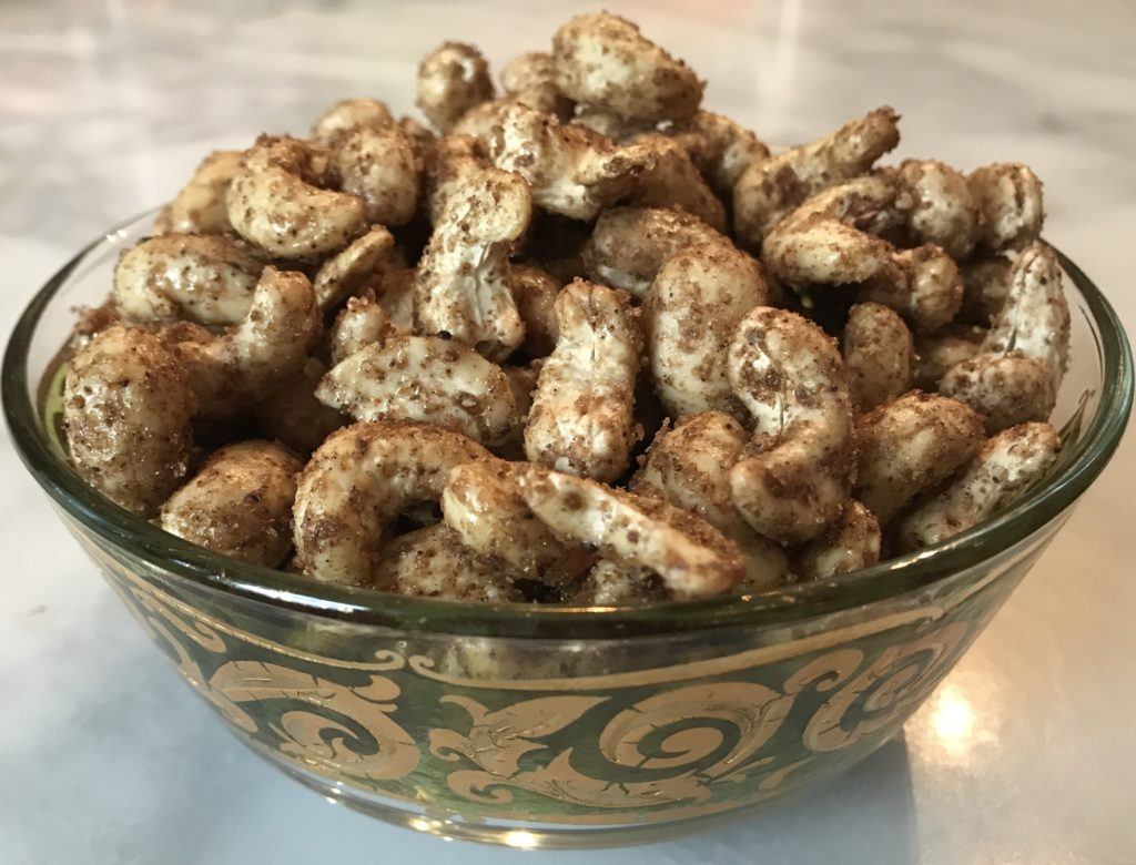 garam masala cashews in a pretty bowl