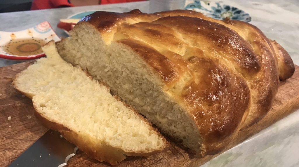 fresh, homemade challah bread braided loaf