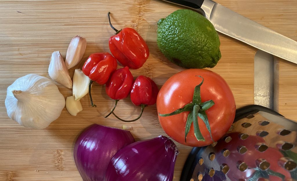 pili pili sauce ingredients: habenero, red onioin, garlic, tomato and lime