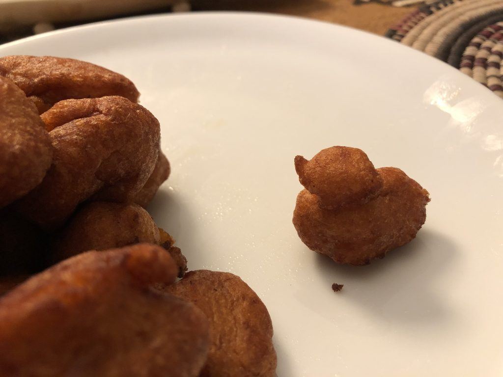 fresh kosai or bean fritters, one of which is shaped like a duckling