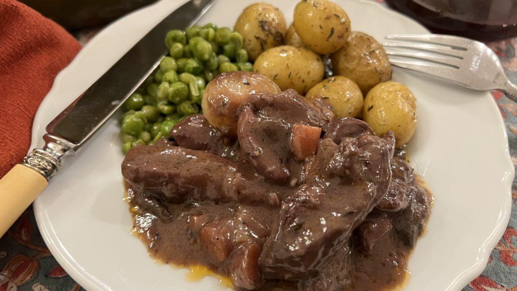à table: home made coq au vin and buttered peas and parsley potatoes